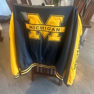 U of Michigan distressed tailgating jacket.